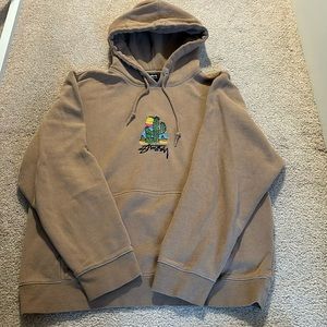 Tan, Stussy hoodie with cactus embroidery.